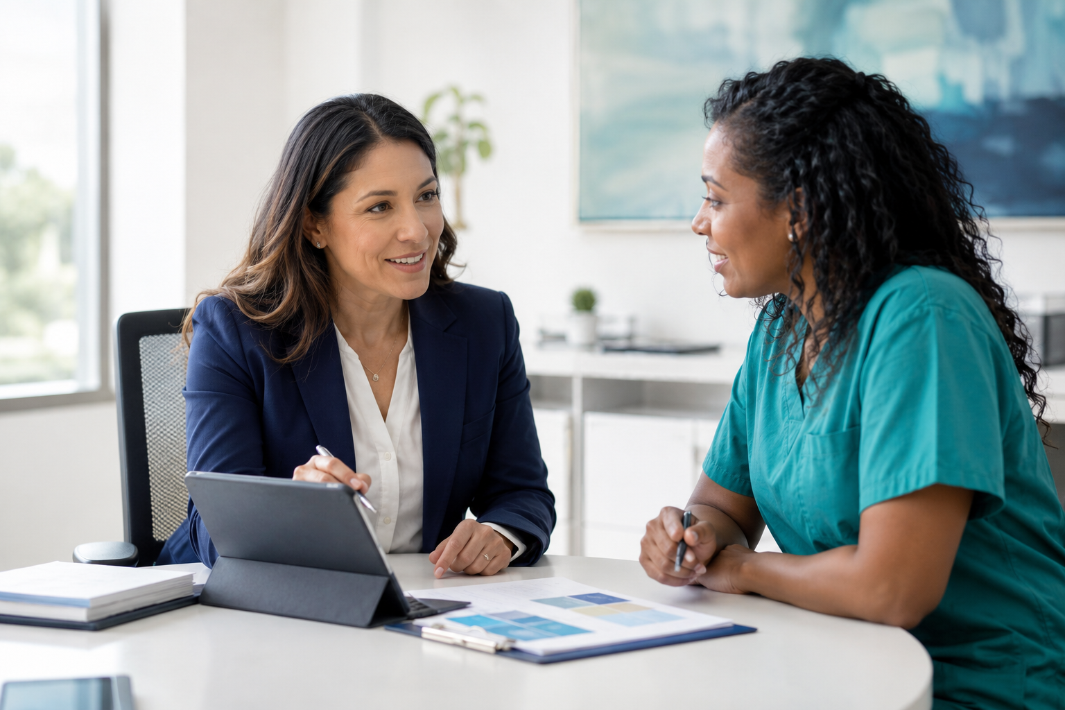 Healthcare facility representative discussing staffing requirements with a professional staffing coordinator